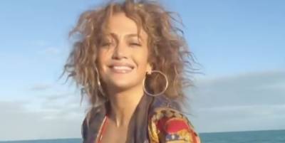 Here's Jennifer Lopez Meditating and Showing Off Her Abs in a Red Bikini - www.elle.com