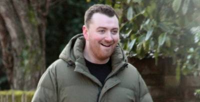 Sam Smith is All Smiles While Walking with a Friend in London - www.justjared.com - London