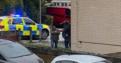 Moment armed police storm north Manchester street after man 'shot with pellet gun' - www.manchestereveningnews.co.uk - Manchester