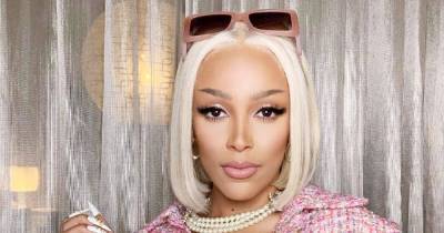 Doja Cat Sizzles on the Set of Her New Music Video Wearing Chanel - www.usmagazine.com