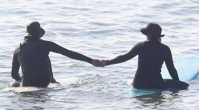 Leighton Meester & Adam Brody Adorably Hold Hands While Riding Their Surfboards in the Ocean - www.justjared.com - Malibu - county Ocean