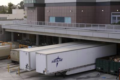 Temporary Morgue Erected In L.A. Parking Lot Uses 10 Tractor Trailers To Deal With Overflow Due To Record Covid-19 Deaths - deadline.com - California