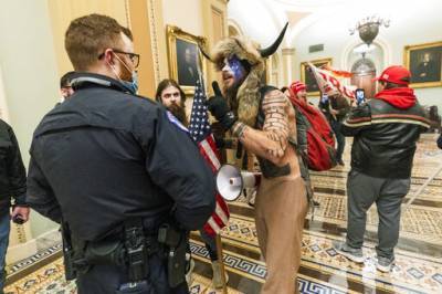 Jake Angeli, The Horned Headdress Capitol Protester, Arrested By Federal Agents - deadline.com - Arizona