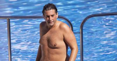 James Argent displays incredible seven stone weight loss as he goes swimming in Spain - www.ok.co.uk - Spain