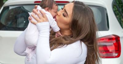Lauren Goodger looks happy and healthy as she dotes on baby daughter Larose on walk - www.ok.co.uk