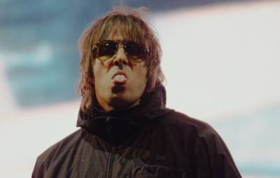 Liam Gallagher says falling out of a helicopter was “an act of God” - www.nme.com - county Isle Of Wight