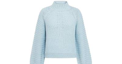 We’re Cozying Up in This Adorable Cropped Sweater Once Temps Drop - www.usmagazine.com