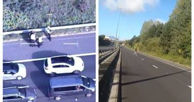 'Drunken aggressive' man closed down M602 by running in front of traffic before being 'rugby-tackled' by a passer-by - www.manchestereveningnews.co.uk