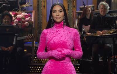 Kim Kardashian jokes about Kanye West and Travis Barker during ‘SNL’ hosting gig - www.nme.com