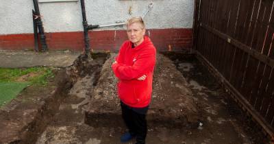 Scots nurse left with huge crater in garden by builder handed £9k by mystery donor - www.dailyrecord.co.uk - Britain - Scotland