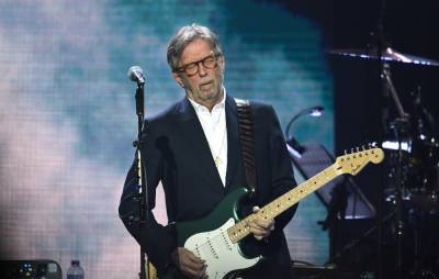 Eric Clapton reportedly donated £1,000 and lent his own van to anti-lockdown music group touring the UK - www.nme.com - Britain
