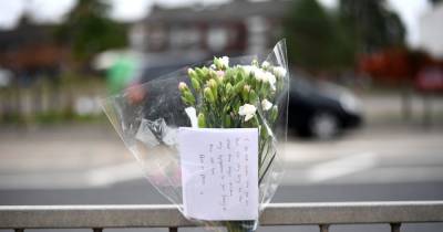 Man who died after being hit by car is named as tributes left at scene - www.manchestereveningnews.co.uk