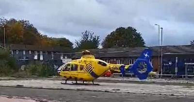 Air ambulance called and man taken to hospital after being 'attacked with broken bottle' - www.manchestereveningnews.co.uk
