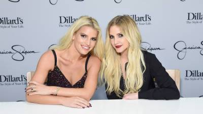 Ashlee, Jessica Simpson stun in glamorous sparkling dresses at friend’s wedding ‘full of fancy gowns’ - www.foxnews.com