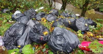 Rogue landlord fined as rubbish dumped by river while tenants lived without bins - www.manchestereveningnews.co.uk - county Oldham