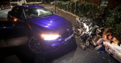 Family woken by 'huge bang' as BMW smashes into wall after police chase - www.manchestereveningnews.co.uk - county Lane