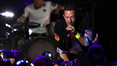 Chris Martin honors girlfriend Dakota Johnson during Coldplay concert: 'This is about my universe' - www.foxnews.com - London