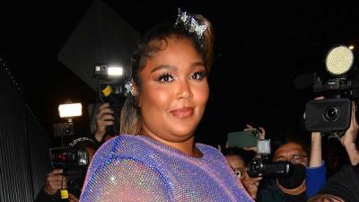 Lizzo Slams Critics of the See-Through Dress She Wore to Cardi B's Birthday Party - www.etonline.com