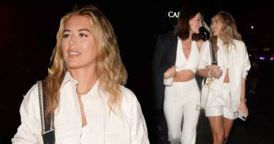 Arabella Chi puts on a leggy display as she steps out in white shorts - www.msn.com - London