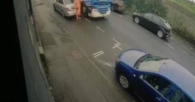 Moment 20-tonne bin lorry rolls down Glasgow street crashing into parked cars - www.dailyrecord.co.uk