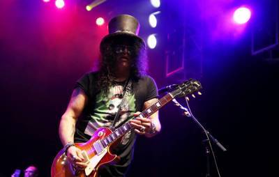 Slash to release new single ‘The River Is Rising’ on Friday - www.nme.com