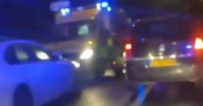 Arrests after car hits bridge and plummets into river following police chase - www.manchestereveningnews.co.uk