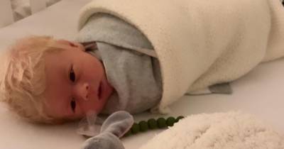 Baby born with a mop of pure white hair stuns midwives who 'take him on a tour' of hospital - www.dailyrecord.co.uk