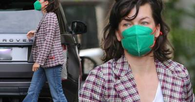 Milla Jovovich and her husband Paul Anderson step out for a lunch date - www.msn.com