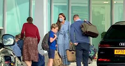 Kate and William spotted with children at airport after Queen's hospitalisation - www.ok.co.uk