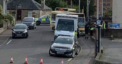 Bus ploughs into wall on Scots road as emergency services race to scene - www.dailyrecord.co.uk - Scotland