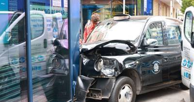 Three people hurt as taxi crashes into a building in Manchester city centre - www.manchestereveningnews.co.uk - Manchester