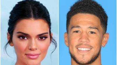 Kendall Jenner and Devin Booker Just Had a Rare PDA Moment Kissing at a Basketball Game - www.glamour.com