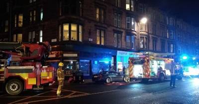Fire crews rush to scene of blaze at building on busy Glasgow street - www.dailyrecord.co.uk - Scotland
