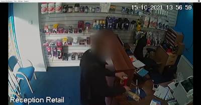 Brazen thief steals charity box while staring at shop security camera as owner works upstairs - www.manchestereveningnews.co.uk - Britain - county Oldham