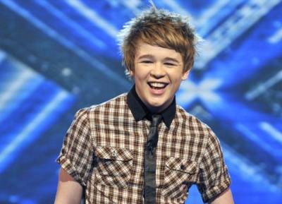 Eoghan Quigg looks world away from X Factor days as he cradles his baby girl - evoke.ie - Ireland