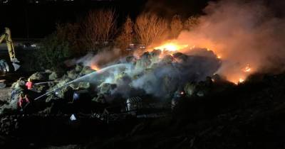 Massive blaze tackled by firefighters throughout the night - with smoke still blowing over M62 - www.manchestereveningnews.co.uk - Manchester - county Lane