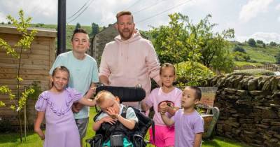Superdad who devoted his life to adoptive children 'blown away' by special honour - www.dailyrecord.co.uk
