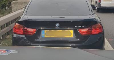 Police slam M60 driver with eight-month-old daughter sat in his lap - www.manchestereveningnews.co.uk - Manchester