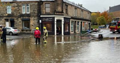 Businesses flooded as heavy rain hits Falkirk leaving streets under water - www.dailyrecord.co.uk