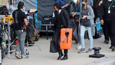 Keanu Reeves, 57, Helps Move Equipment On ‘John Wick 4’ Set — Photo - hollywoodlife.com