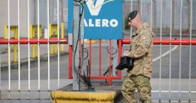 Armed forces spotted at Greater Manchester fuel depot as they prepare to help during crisis - www.manchestereveningnews.co.uk - Manchester
