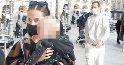 Alicia Vikander - Alicia Vikander cradles her baby while arriving at a hotel in Paris - msn.com - Paris