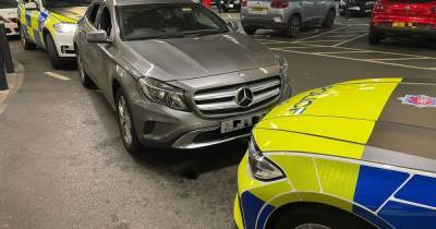 Three arrested after car driven wrong way along two major roads before being abandoned - www.manchestereveningnews.co.uk - Manchester