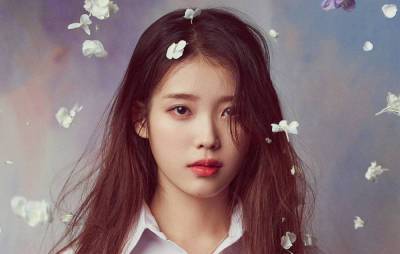 IU confirms plans to release new digital single ‘Strawberry Moon’ - www.nme.com