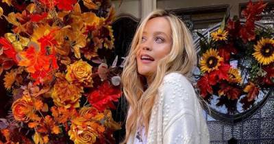 Laura Whitmore shows off amazing autumnal door display as she poses in cosy clothes - www.ok.co.uk
