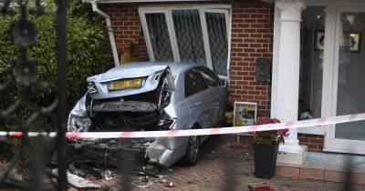 Man arrested after baseball bat-wielding thugs attack house before ramming Mercedes into it - www.manchestereveningnews.co.uk - Manchester