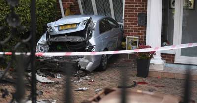 Gang of thugs smash Mercedes into house before attacking it with 'baseball bats' - www.dailyrecord.co.uk - Scotland - Manchester