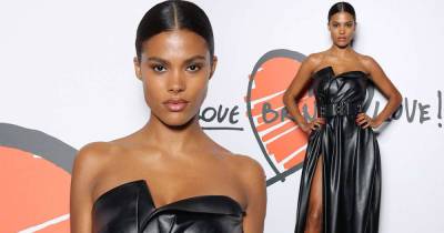 Vincent Cassel's wife Tina Kunakey wows in a leather strapless dress - www.msn.com