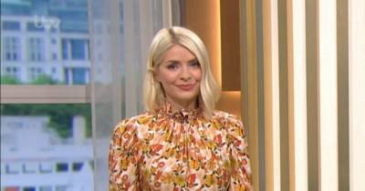 Holly Willoughby shows off flawless figure in chic floral dress on This Morning - www.ok.co.uk
