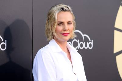 Charlize Theron Thanks ‘Village Of Strong Black Women’ For Parenting Tips: ‘They Put Me In My Place’ - etcanada.com